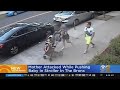 Woman attacked while pushing stroller