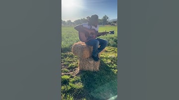 Thumbnail of Me playing my new song “Let it Burn” on guitar, out now! 🌾❤️‍🔥
