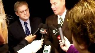 Premier David Alward, Keith Ashfield and Brad Woodside in media scrum