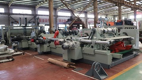 Veneer production line with log debarker veneer peeling machine