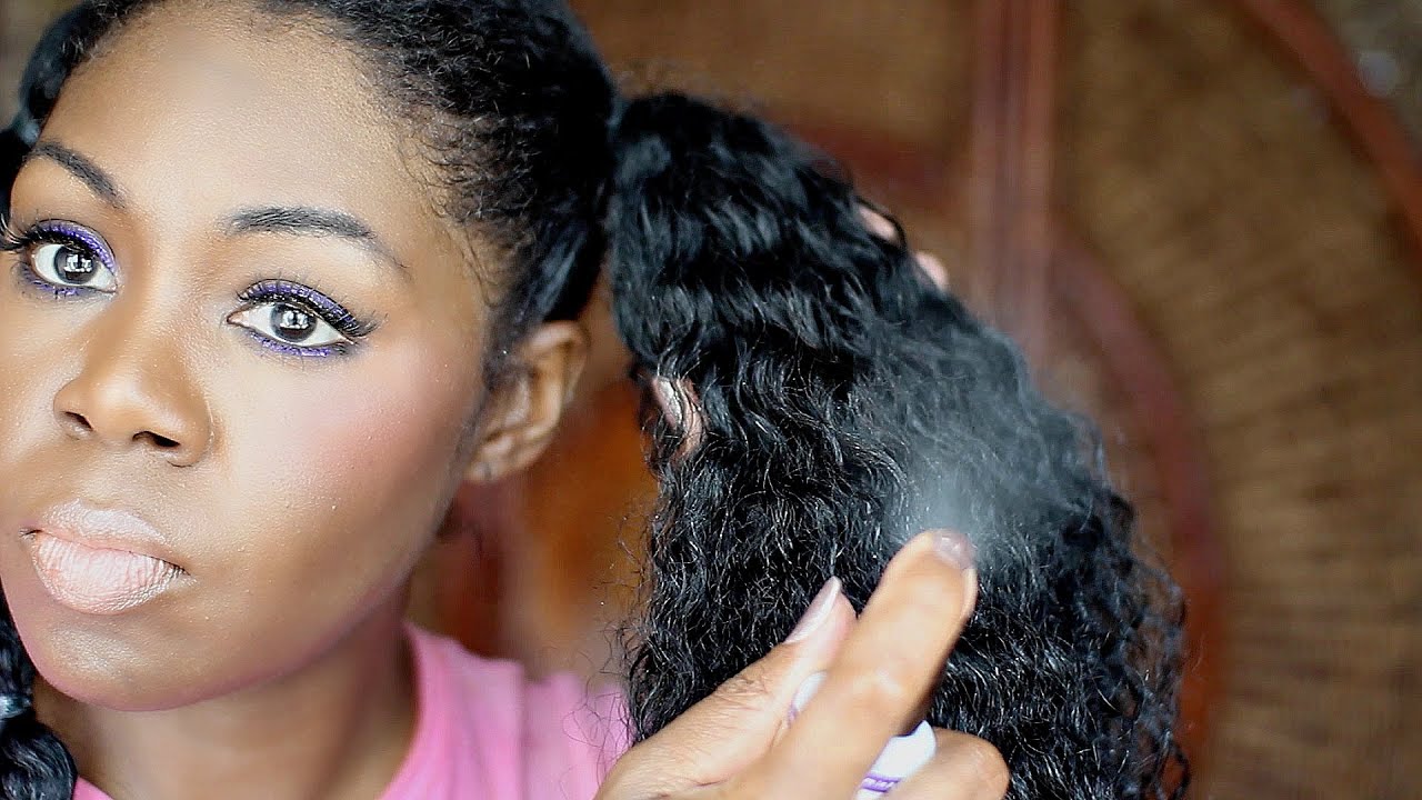 My hair is currently co-washed, deep conditioned, heatless, stretched air d...