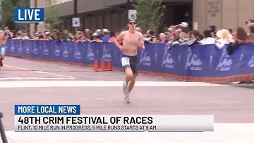 Racers cross the finish line at the Crim Festival of Races