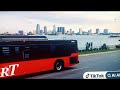 RED AND BLACK EX DDOT SMART D40LF NEW FLYER RT 275 TELEGRAPH SOUTH DRIVING THROUGH DETROIT RIVER
