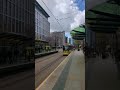 Manchester Metrolink Tram Pulling into the Station