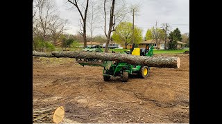 EASY LAND CLEARING WITH THE JOHN DEERE 1025R AND THE FRONTIER AV20F ROOT GRAPPLE