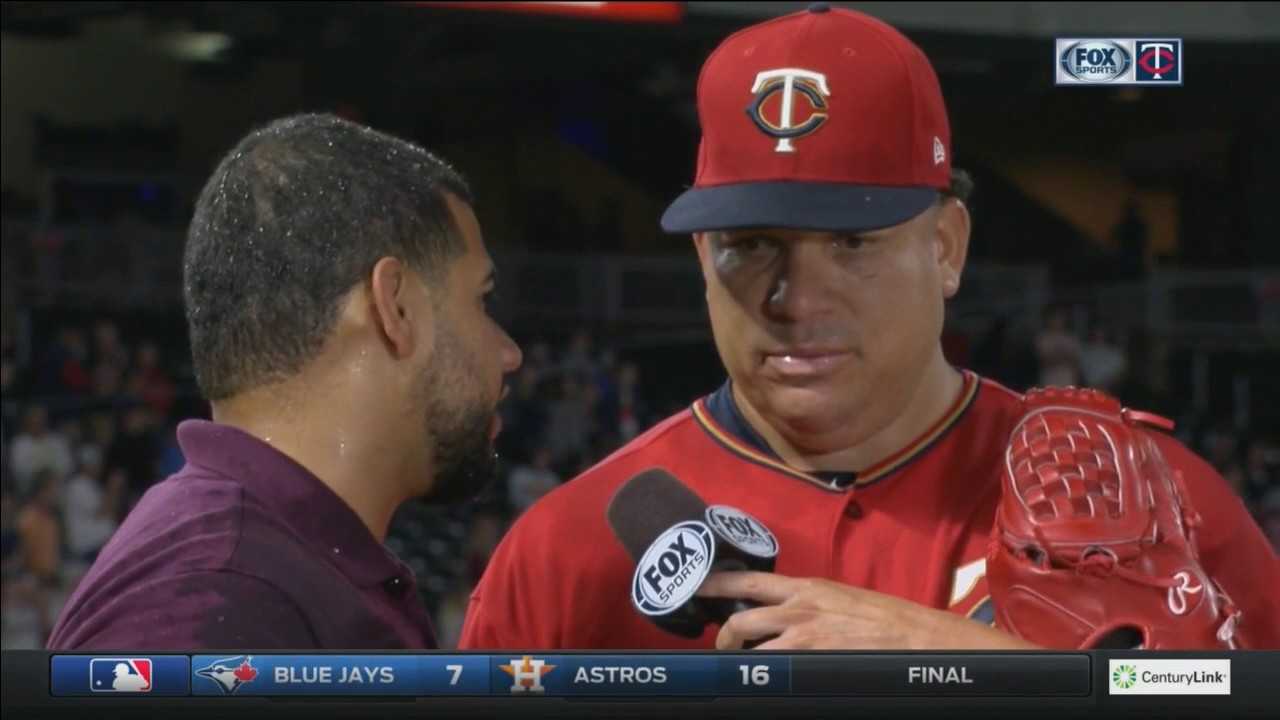 Bartolo Colon doused by Twins teammates after complete game 