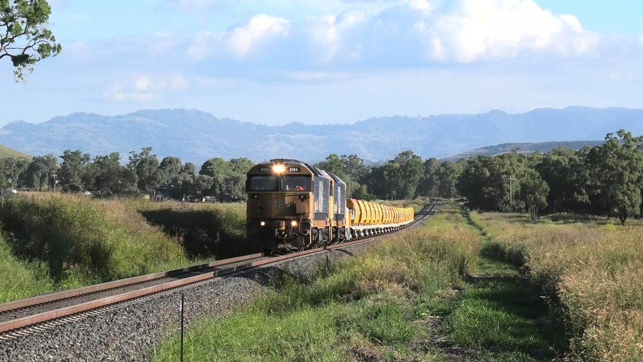 8184 + 8128 works a down loaded A.R.T.C. ballast train approaching Braefield Sth  of Quirindi 8/2/21