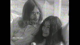 John Lennon and Yoko Ono promote peace with bed in