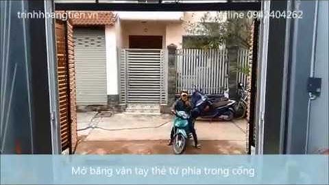 Cổng xếp 4 cánh ra vào bằng máy vân tay thẻ từ tại quận 2