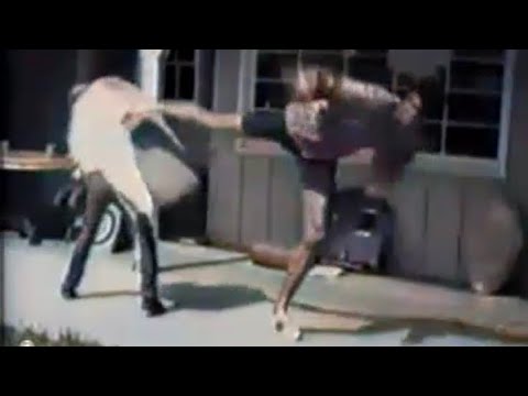 Kareem Abdul-Jabbar practicing kicks in Bruce Lee’s backyard