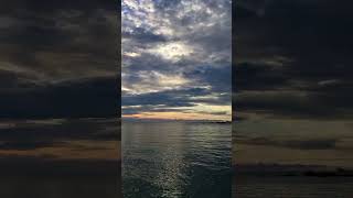 Romantic sunset on the beach with waves sounds