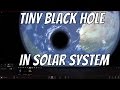 What If the Smallest Black Hole Entered the Solar System?