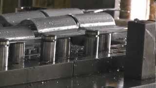 progressive tool; pole clamp stamping