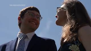 Couples marry during total solar eclipse