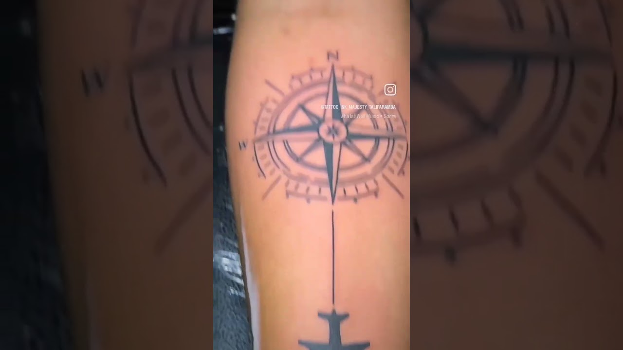 compass and plane tattoo