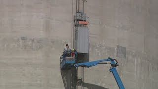 2 workers rescued after getting stuck in grain elevator