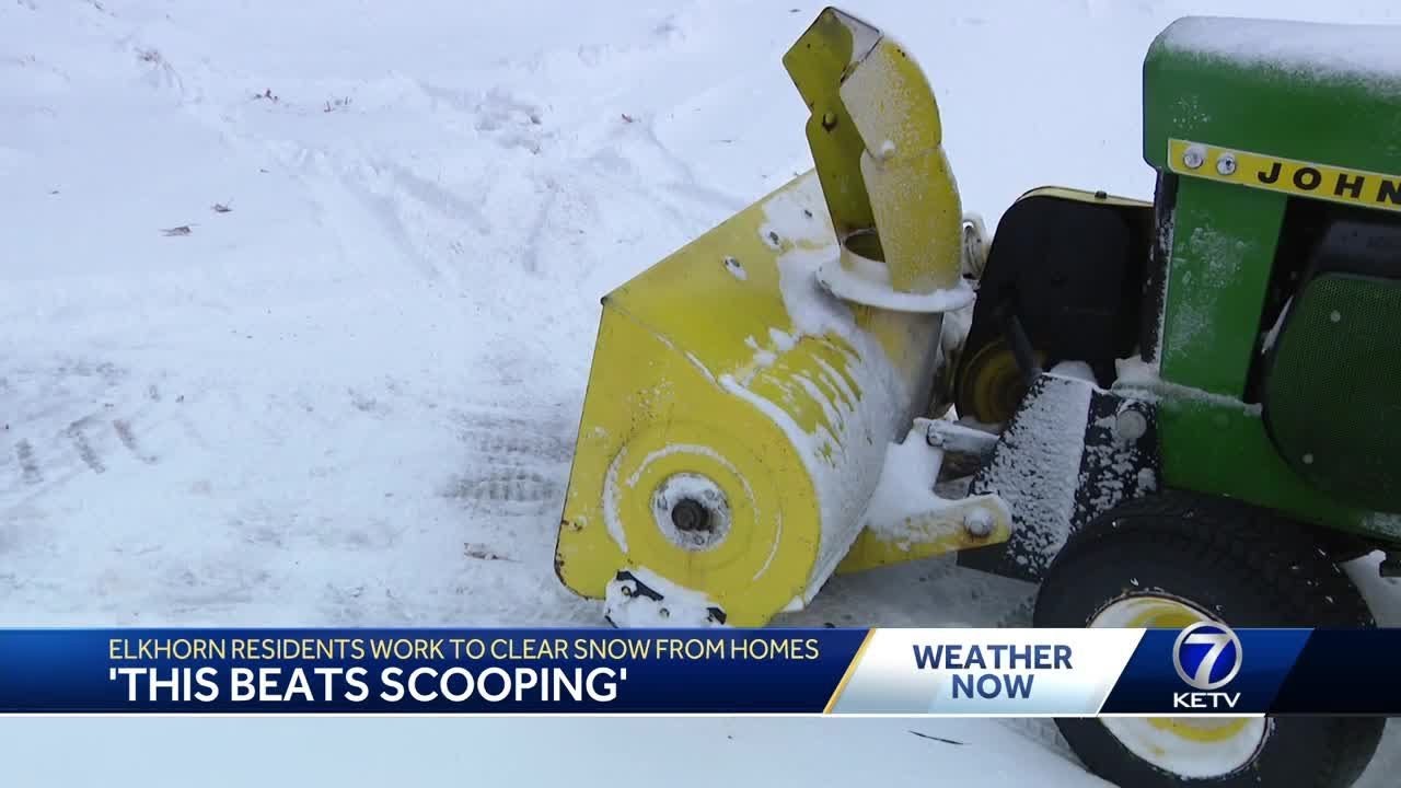 'This beats scooping' Elkhorn residents work to clear snow from homes