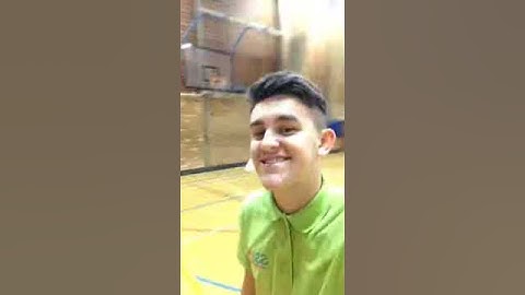 Football shot into basketball hoop