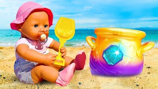Baby dolls playing &amp; feeding at the beach. Baby Alive doll &amp; Mermaid doll. Baby dolls &amp; toys.