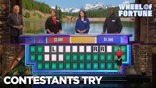 Contestants Try to Solve 