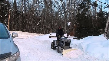 International Cub 129 Plowing Snow