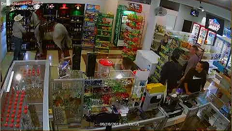 Drunk man rides horse into liquor store for more liquor.