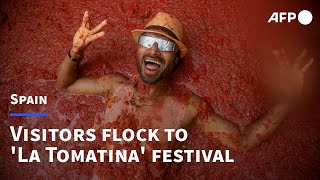 Visitors gather in Spain for 'La Tomatina' festival | AFP