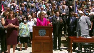 Gov. Kim Reynolds signs reform bill
