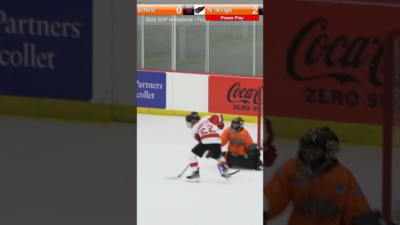 Henry Carron makes a big save against the Northern Wings forecheck  
