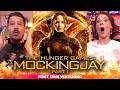 THE HUNGER GAMES: MOCKINGJAY PART 1 *First Time Watching Reaction!* THESE ARE AMAZING!