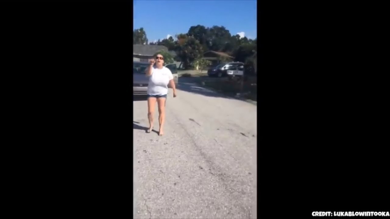 WOMAN TRIES TO RUN OVER KID - YouTube