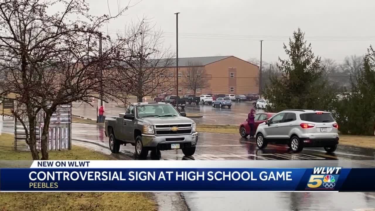 Controversial sign at high school game in Peebles