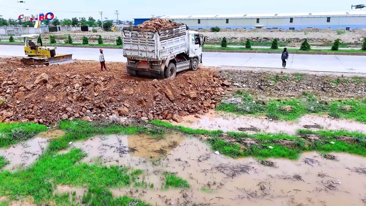 NICELY! START PROJECT Landfill By Excellent Skill Driver Dozer KOMATSU D31P And 5T Trucks unloading