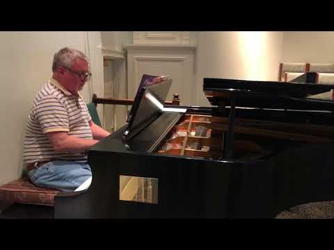 Rick Robertson plays “The Solid Rock”