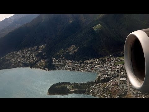 Flying over New Zealand from south to north. Nice views of Lake Wakatipu and Queenstown. Passing over Mount Cook - the highest mountain in New Zealand. Later a landing at Auckland Airport....