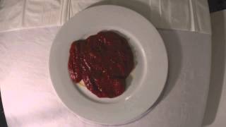 Disappearing Tomatoe Sause ( logo on plate )