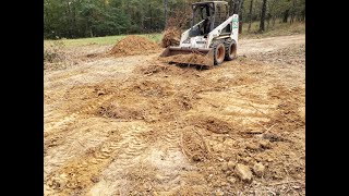 Getting practice with my new 19 year old Bobcat 753G