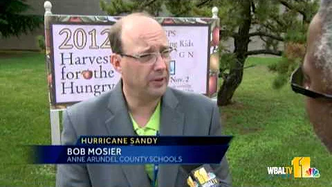 Schools, students watch Hurricane Sandy