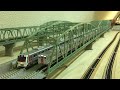 Nゲージ高架線TOMIX大トラス鉄橋６連走行シーン:鉄道模型レンタルレイアウト サード…