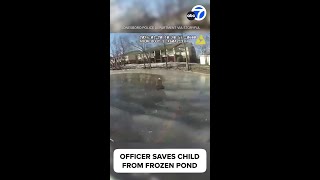 Video shows officer rescuing child who fell through frozen pond