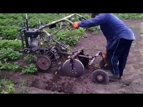 Дисковый окучник с опорными дисками
