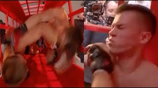 Russian Fighter Gets Lit Up With A Mean Combo During A Boxing Match Inside A Phone Booth