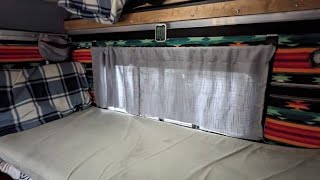 How I Added Curtains To My Truck Camper using a magnetic curtain rod