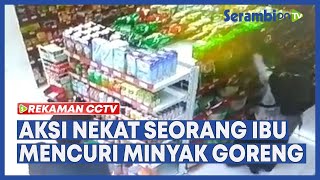 Rekaman CCTV Aksi Nekat Seorang Ibu di Madiun Mencuri Minyak Goreng Kemasan di Minimarket