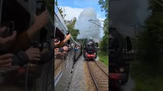 steam engine train locomotive eats clouds in reverse