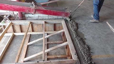 Concrete pour for dock leveler pit walls.