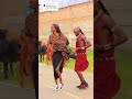 Dinka And Kenyan Couple Doing A South Sudanese Traditional Dance Dinka And Kenyan Couple Doing A South Sudanese Traditional Dance
