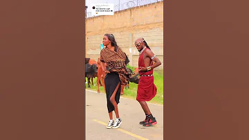 Dinka And Kenyan Couple Doing A South Sudanese Traditional Dance 