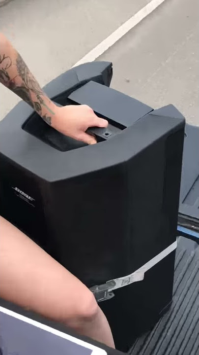 2 Bose F1 812's on the bed of a pick up truck