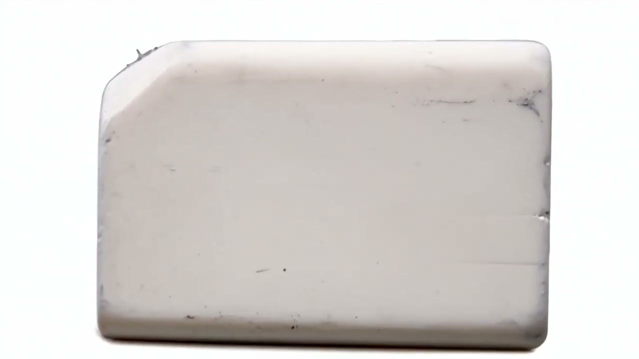 A school eraser,  pure white background 一块学生橡皮，纯白背景 | Royalty Free Videos and Photos